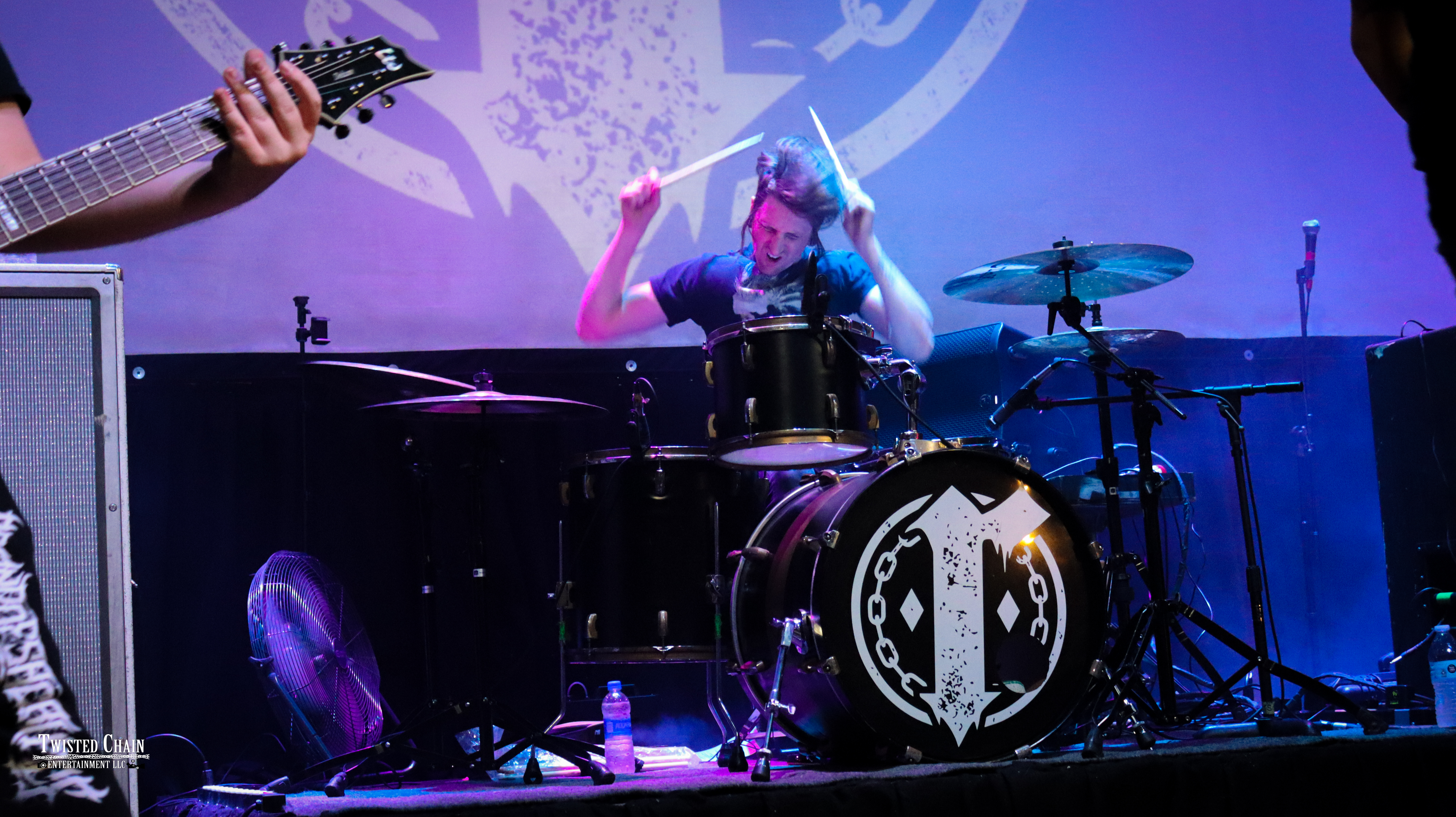 Drummer in action with motion blur